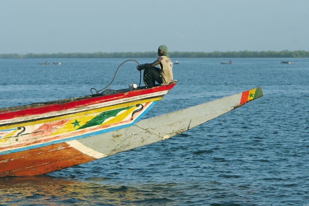 A fisherman on a boat