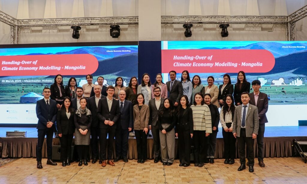 Group of people posing for the photograph during the handover of the Climate Economy Modelling-Report in Mongolia